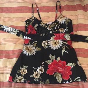 Camisole strappy top with tie in back.